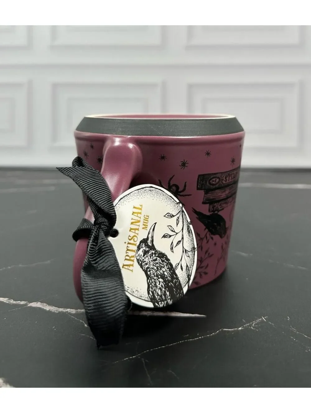 Connecting on Paper 2021 co. Crafted Ceramic Mug with Raven and Spellbook Design